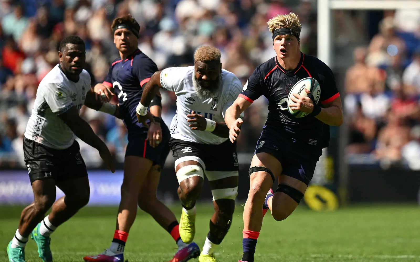 England's Henry Pollock runs with the ball during the Rugby Union Nations Championship match between Fiji and England at Hill Dickinson Stadium in Liverpool on July 11, 2026.