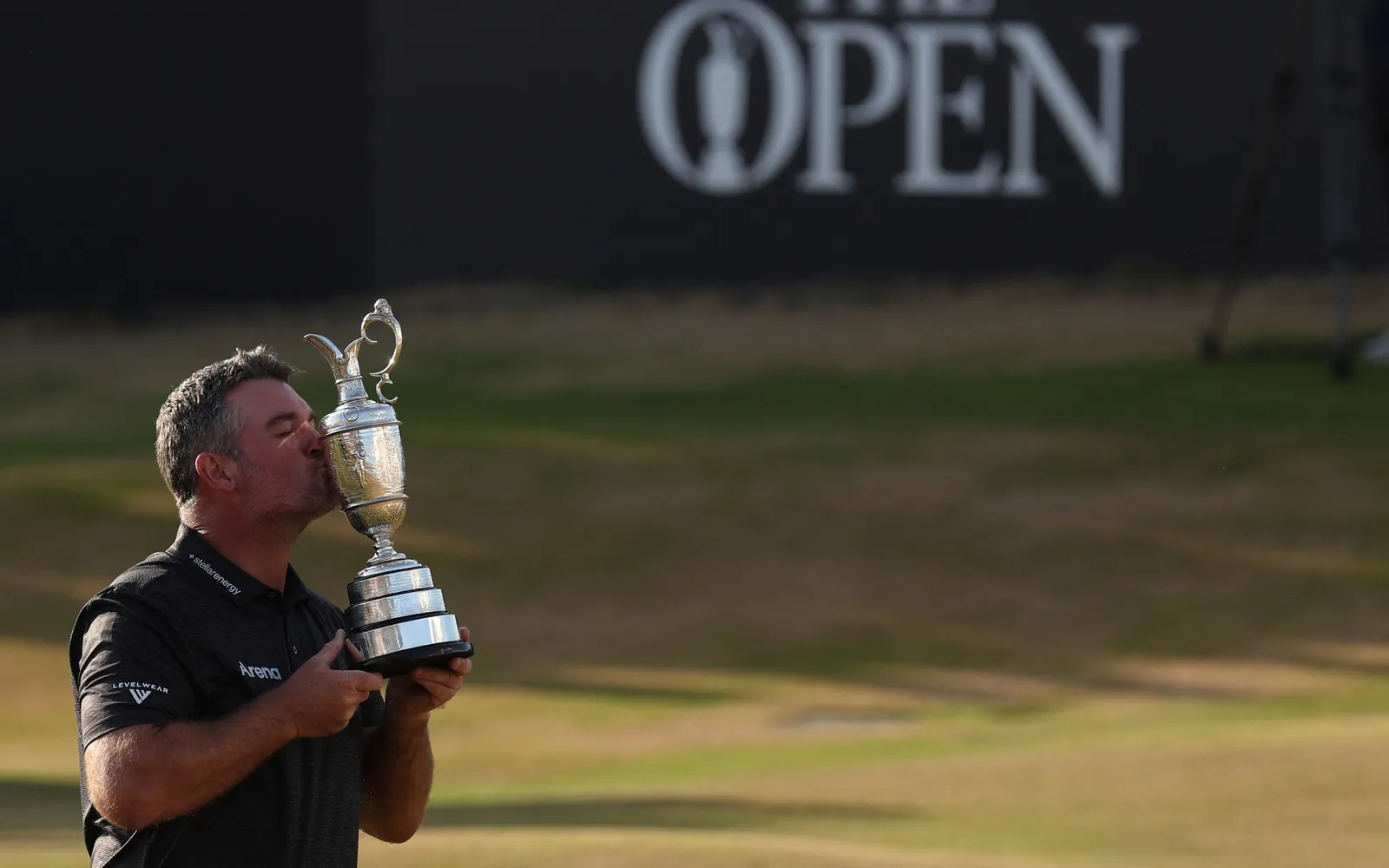 New Zealand's Ryan Fox kisses the Claret Jug, the trophy for the Champion golfer of the year after his victory in the 154th Open Golf championship at Royal Birkdale Golf Club near Southport on July 19, 2026. (Photo by Adrian Dennis / AFP) / RESTRICTED TO EDITORIAL USE